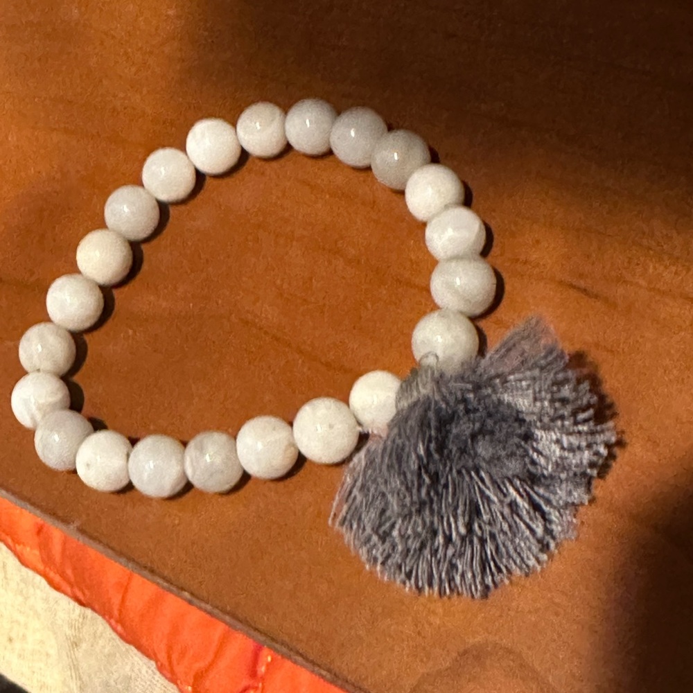 White Beaded Bracelet with Gray Tassel